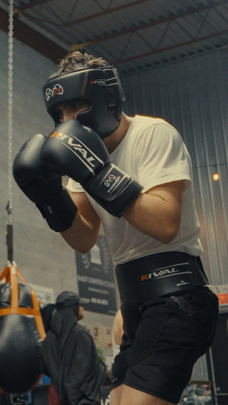 Amateur boxer wearing Rival gloves