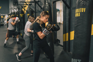 Fitness boxing class training with Rival gear